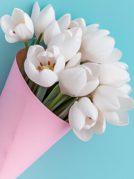 Close bouquet of white tulips wrapped in pale pink paper. Perfect for spring floral campaigns, gift branding, and minimalist editorials.