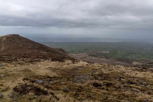 Scenic mountain landscape in Mourne Mountains ,Silent Valley mountain park under a cloudy sky
