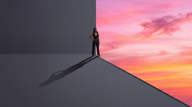 Woman Standing on Edge Looking Toward Vibrant Sunrise Sky