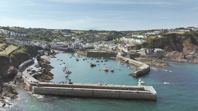 Cliffs and a harbor over Port Village from a drone, Charlestown, St Austell, Cornwall, England