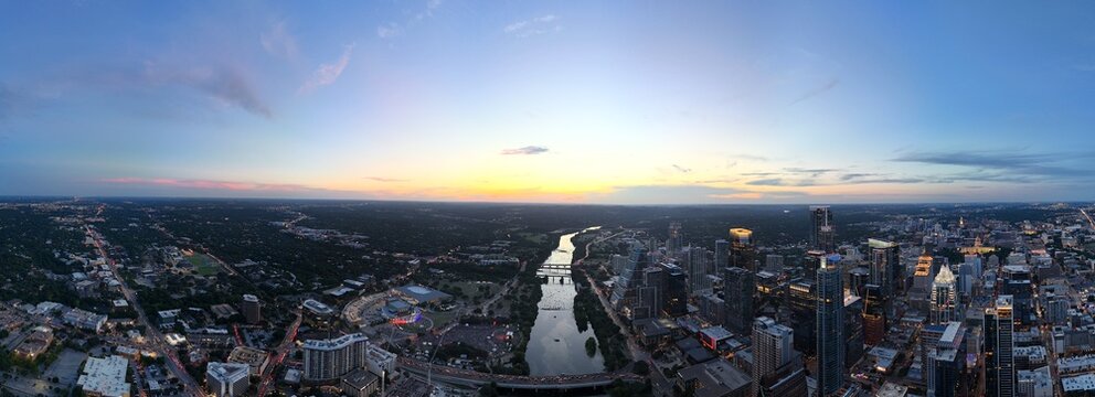 Sunset panorama looking over Town Lake with bridges 