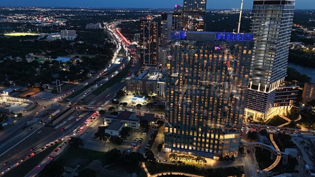 Aerial view of downtown city lights of while the sun is setting