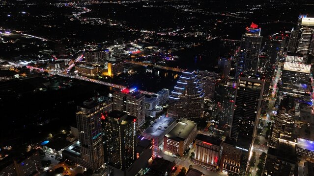 Aerial view of downtown city lights of while the sun is setting