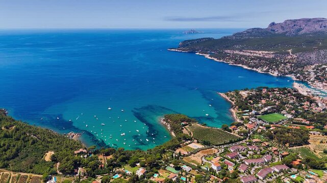 Aerial drone view of bay with turquoise sea and the town of Cassis, Provence, Alps, Cote dAzur, Marseille district, France. High quality 4k footage