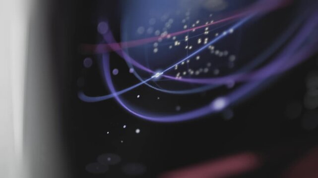 Luminous orbital routes evolve across a black display