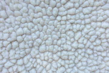White sherpa fleece fabric texture close up background © Iryna Miadzvedzeva