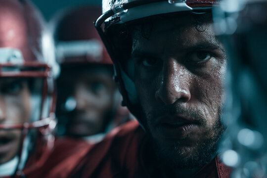 American Football Player with Intense Expression Wearing Helmet
