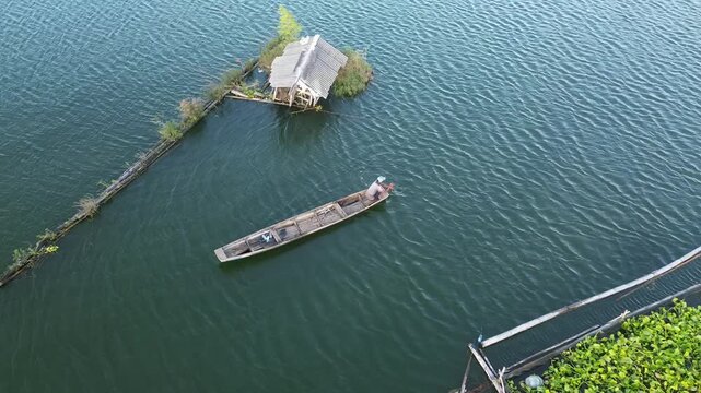 4K Aerial View of Traditional Fishing Boat on Sutami Reservoir in Malang, Indonesia