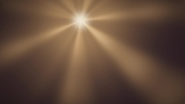 Volumetric light rays radiating god ray beams abstract dark background seamless loop in soft gold tones