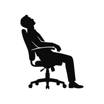 Silhouette of man sitting in chair looking up