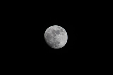 almost full moon in a black background © Alex Borderline