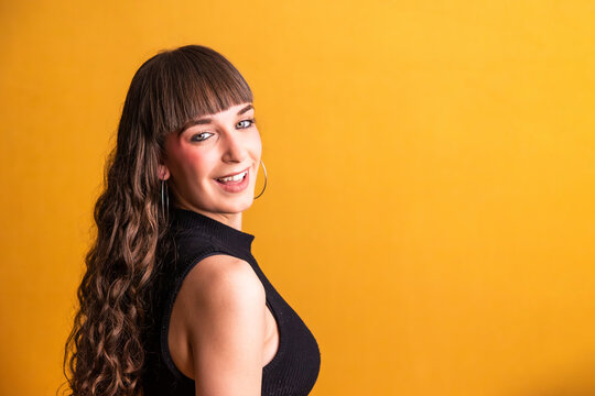 Happy young woman smiling looking at camera