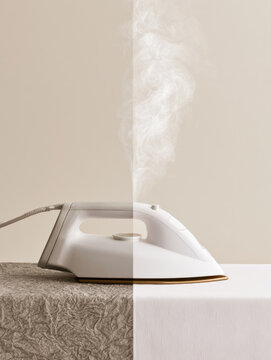 Vertical steam iron split perspective crinkled garment smooth fabric white steam backlit studio high contrast texture sharp edge fabric care ironing appliance