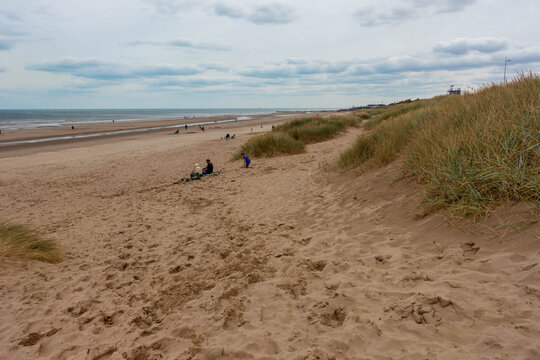 Mablethorpe North End beach is a sandy beach in Lincolnshire, UK seen here beneath a moody, clouds sky