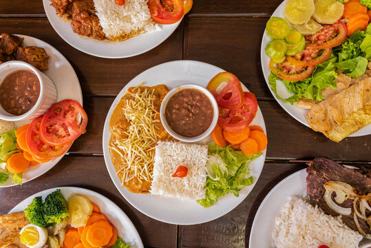 Overhead shot of brazilian cuisine plates composition