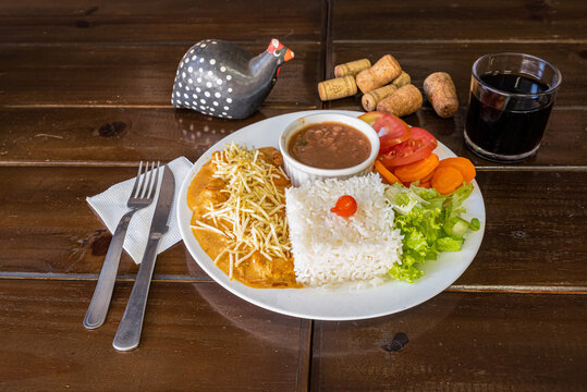 Brazilian Food Plate with Rice and Side Dishes
