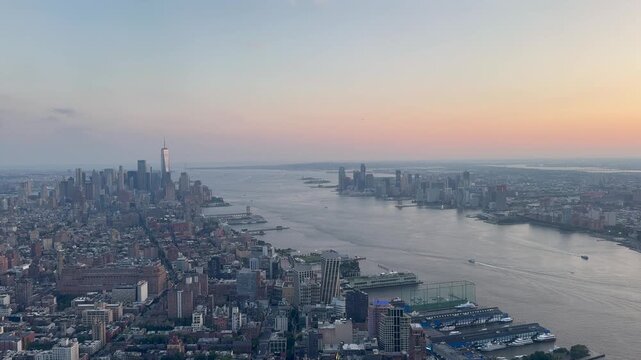 Beautiful panoramic aerial Manhattan, Jersey City, and Hudson River at sunset, New York City