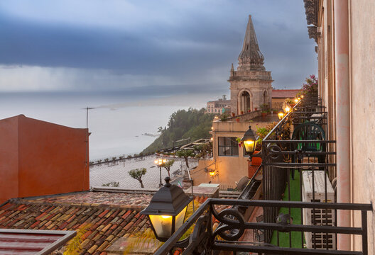 Bell Tower and Ionian Sea After Rain in Taormina, Sicily, Italy