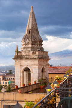 Historic Bell Tower with Mount Etna View in Taormina, Sicily, Italy