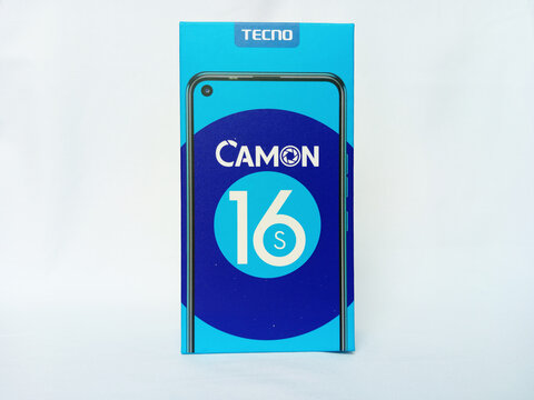 Tecno smartphone paper box package on white background. Camon 16 S phone box designed by Tecno. An android phone with fingerprint and proximity sensor and dual flash. Kumasi, Ghana - December 9, 2025