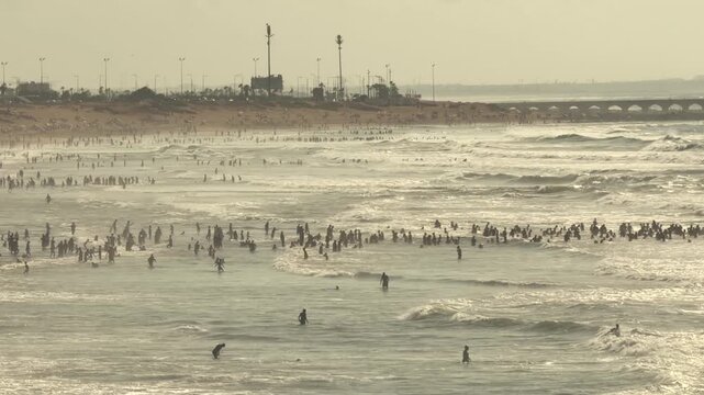 Crowded Beach Casablanca Morocco Atlantic Ocean Horizontal 4K Footage People Swimming Waves Busy Summer Seaside North Africa Travel Coastal Video