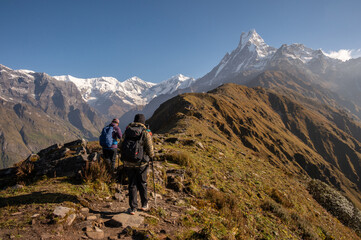 Fototapeta premium Group of tourist walking to Mardi Himal base camp with beautiful view of Mt.Machapuchare. Mardi Himal Trek is one of the newly popular trekking route in the Nepal.