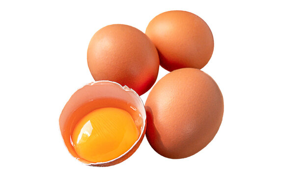 Three brown chicken eggs and one cracked eggshell with raw golden yolk isolated on transparent background. Fresh food ingredient for cooking, baking, breakfast, nutrition and homemade recipes at home.