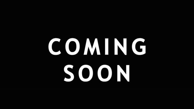 Animated coming soon text with glitch effect in dark setting for promotional announcement