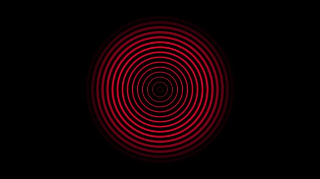Red concentric circles glowing with energy on black background abstract motion concept
