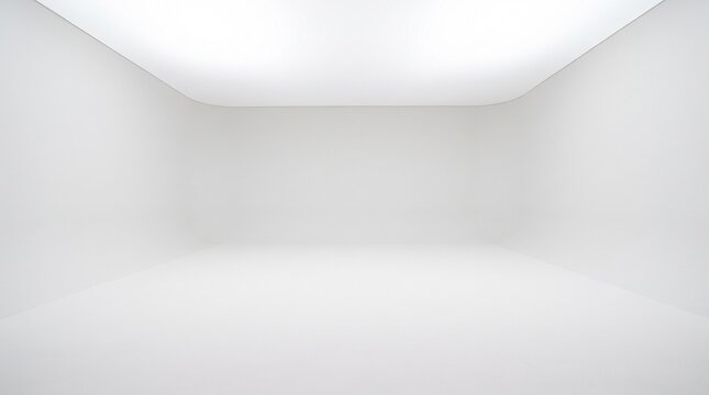 An empty, bright white studio background with smooth curves creating a seamless infinity light box effect, featuring soft overhead illumination.