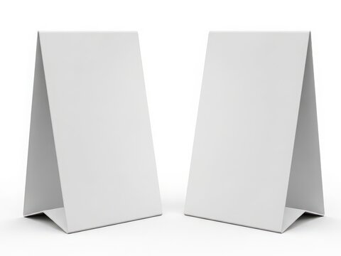 Two empty white paper table tents for restaurant promotion
