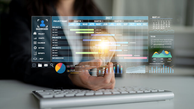 Business Professional Using Interactive Dashboard with Project Management Data and Analytics Visuals for Effective Decision Making Fluxor.
