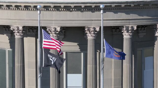 thee flags that waving in the wind