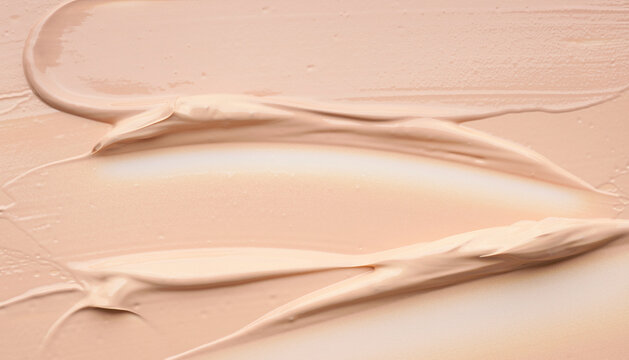 A full-frame textural closeup of smooth nude beige liquid foundation or skincare cream swatches. Great for beauty, skincare branding, makeup product advertisements, or organic spa concepts.