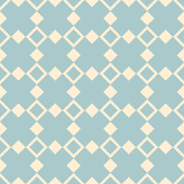Seamless geometric pattern with blue and cream diamond shapes