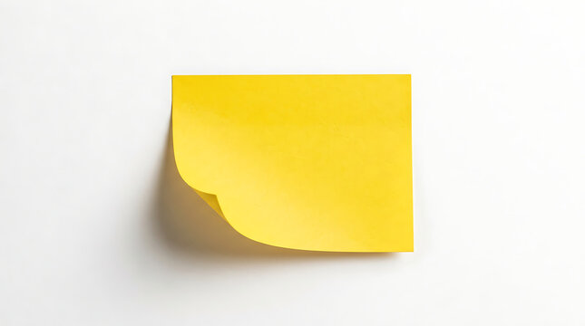 Yellow sticky note with a curled corner isolated on white background