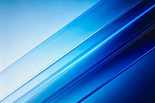 A sleek abstract background featuring diagonal blue gradient lines, with smooth layered shapes and dynamic contrast in cool tones.