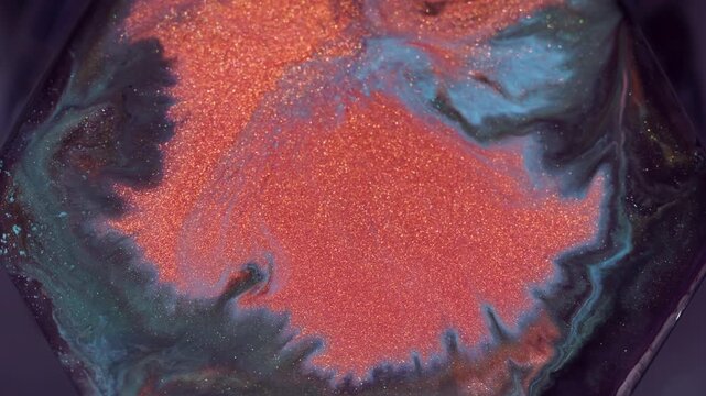 Shimmer paint. Geometric splatter. Defocused blue neon bright color glitter rhombus sparkling rock liquid vibrant orange particles on abstract art background.
