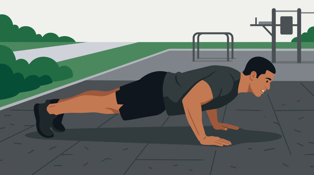 Man performing push-ups outdoors at a fitness park with exercise equipment