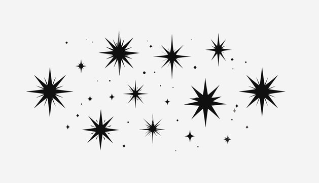 Black sparkling stars and dots creating a glitter effect on a light grey background, a celestial graphic element.