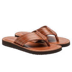Naklejka premium Brown leather flip flops isolated on white background for summer footwear fashion.