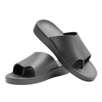 Pair of black rubber thong sandals for summer beach wear and casual poolside footwear