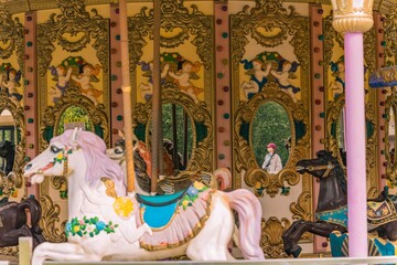 Reflection of a traveler captured in a carousel mirror, Gucun Park, Shanghai © nhat.photograph
