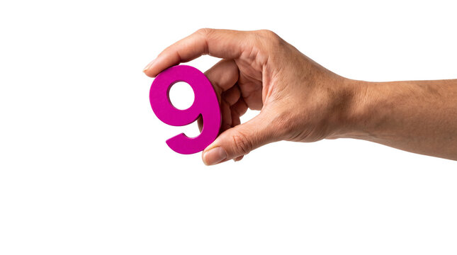 A Person Holding a Vibrant Magenta Colored Number Nine Digit Isolated Against on transparent background for Educational Concepts