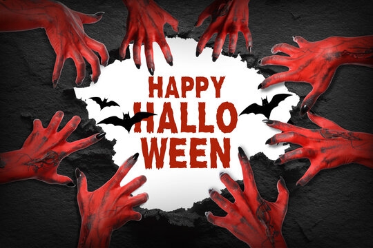 Halloween. Red hands emerge from a dark background, conveying a chilling Halloween atmosphere