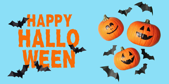 Halloween. Bright pumpkins with spooky faces juxtaposed against playful bats
