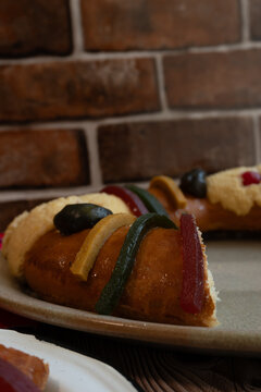 "Rosca de Reyes" or Epiphany bread on a plate. Bread to celebrate January 6
