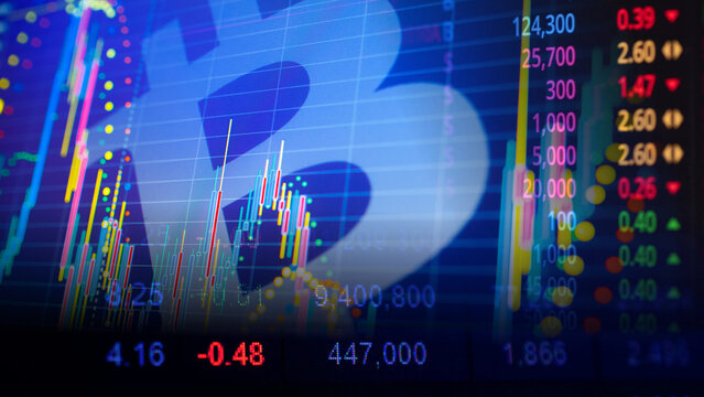 Bitcoin cryptocurrency trading chart and financial investment analysis concept. Digital financial candlestick graph and stock market data ticker overlaying large virtual bitcoin currency logo 