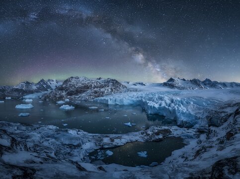 Stunning Milky Way Galaxy Over a Frozen Arctic Landscape with Icebergs.