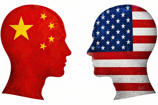 China and usa human head silhouettes with national flags facing each other